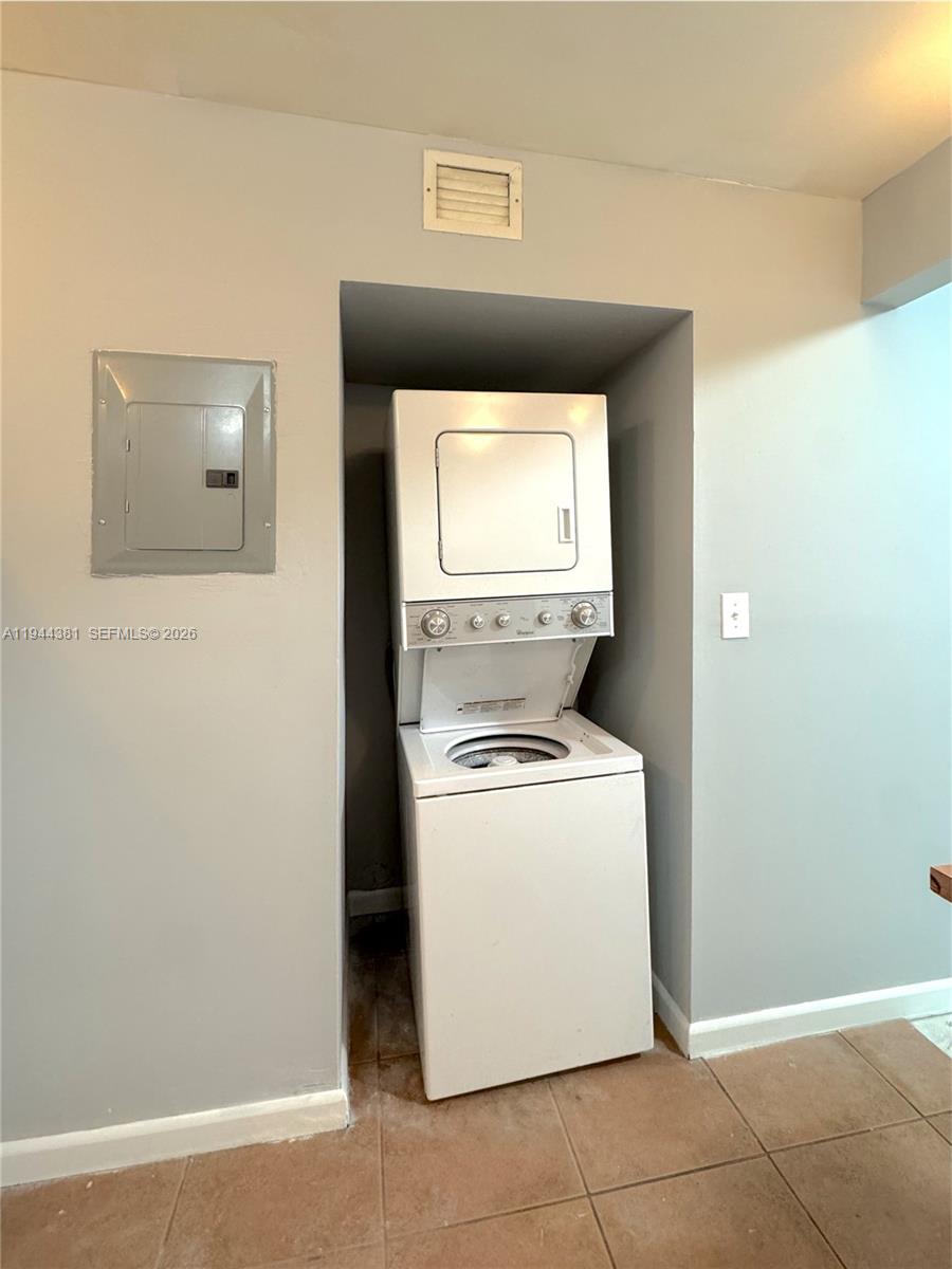 8536 Southwest 156th Court, Unit 210 Miami, FL 33193 - Photo 6 of 17 a utility room with dryer and washer