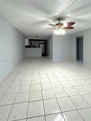 a view of a livingroom with a furniture and window