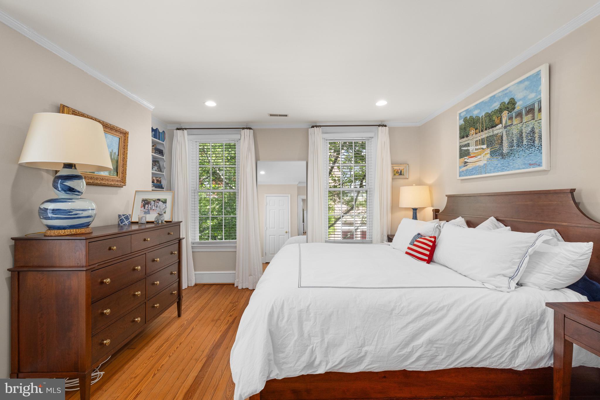 3104 N Street Northwest Washington, DC 20007 - Photo 13 of 25 a bedroom with a bed and a window