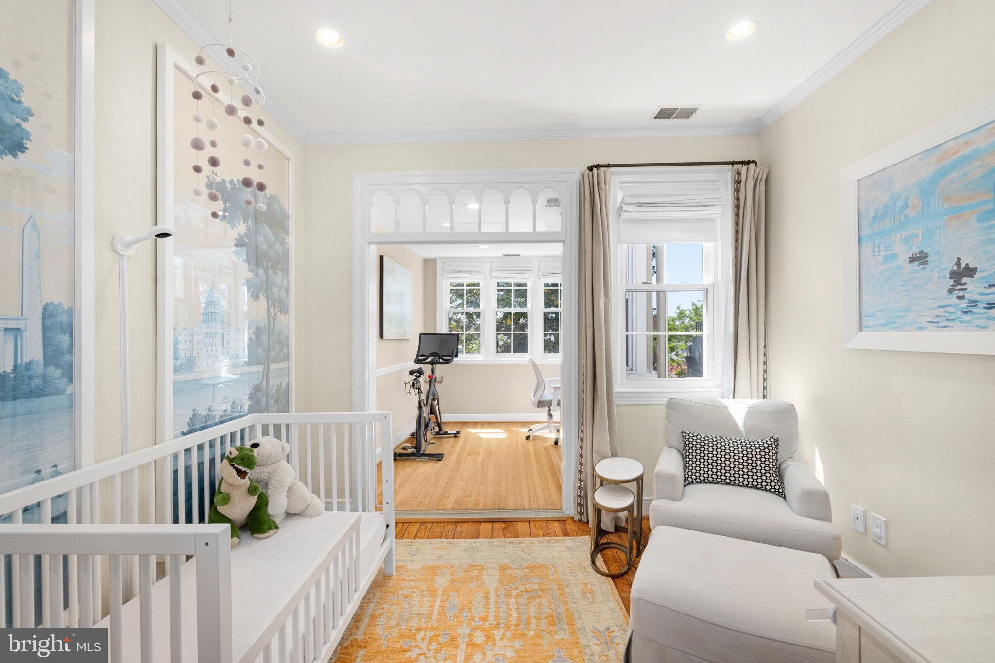 3104 N Street Northwest Washington, DC 20007 - Photo 17 of 25 a living room with furniture and a large window