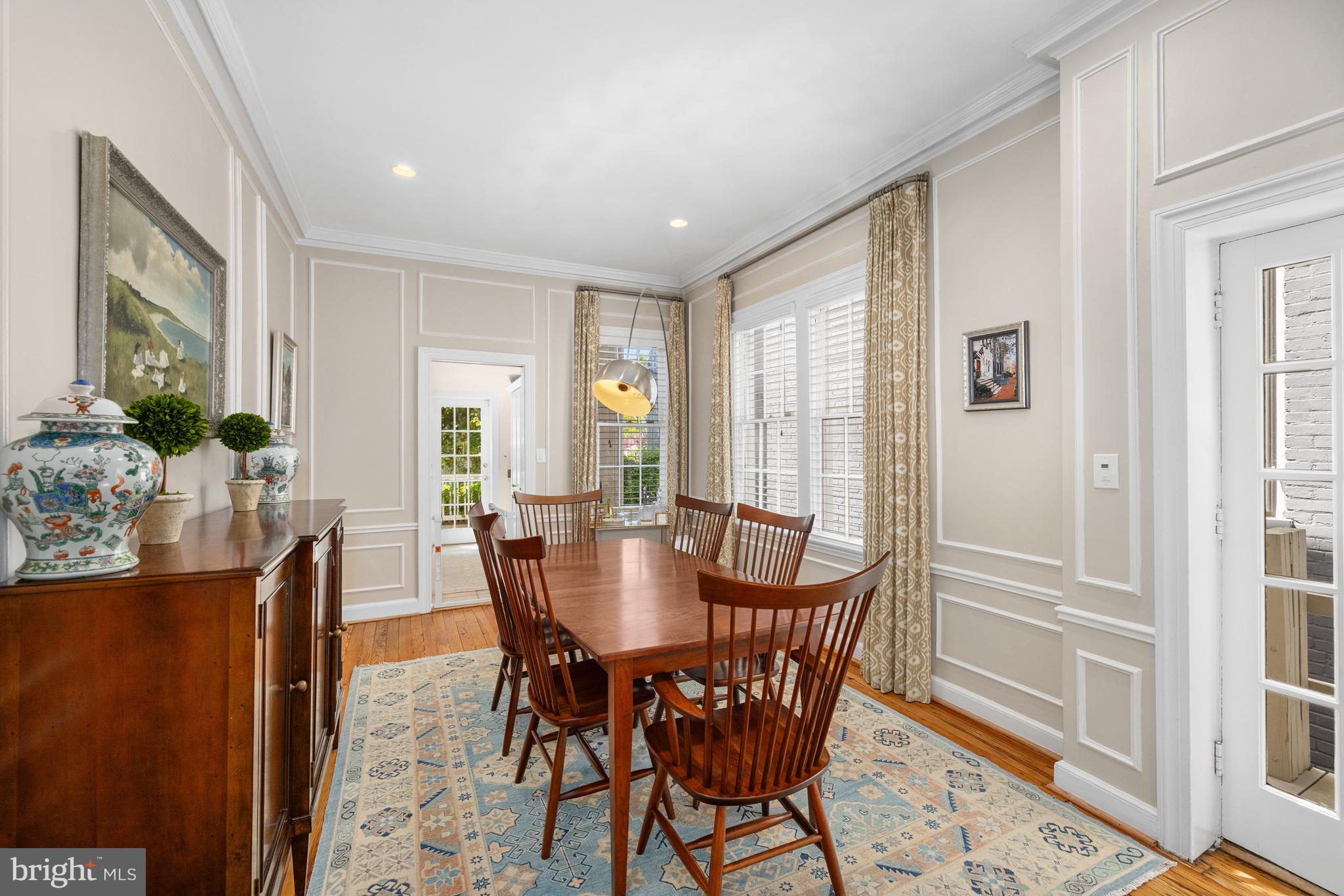 3104 N Street Northwest Washington, DC 20007 - Photo 7 of 25 a view of a dining room with furniture window and wooden floor