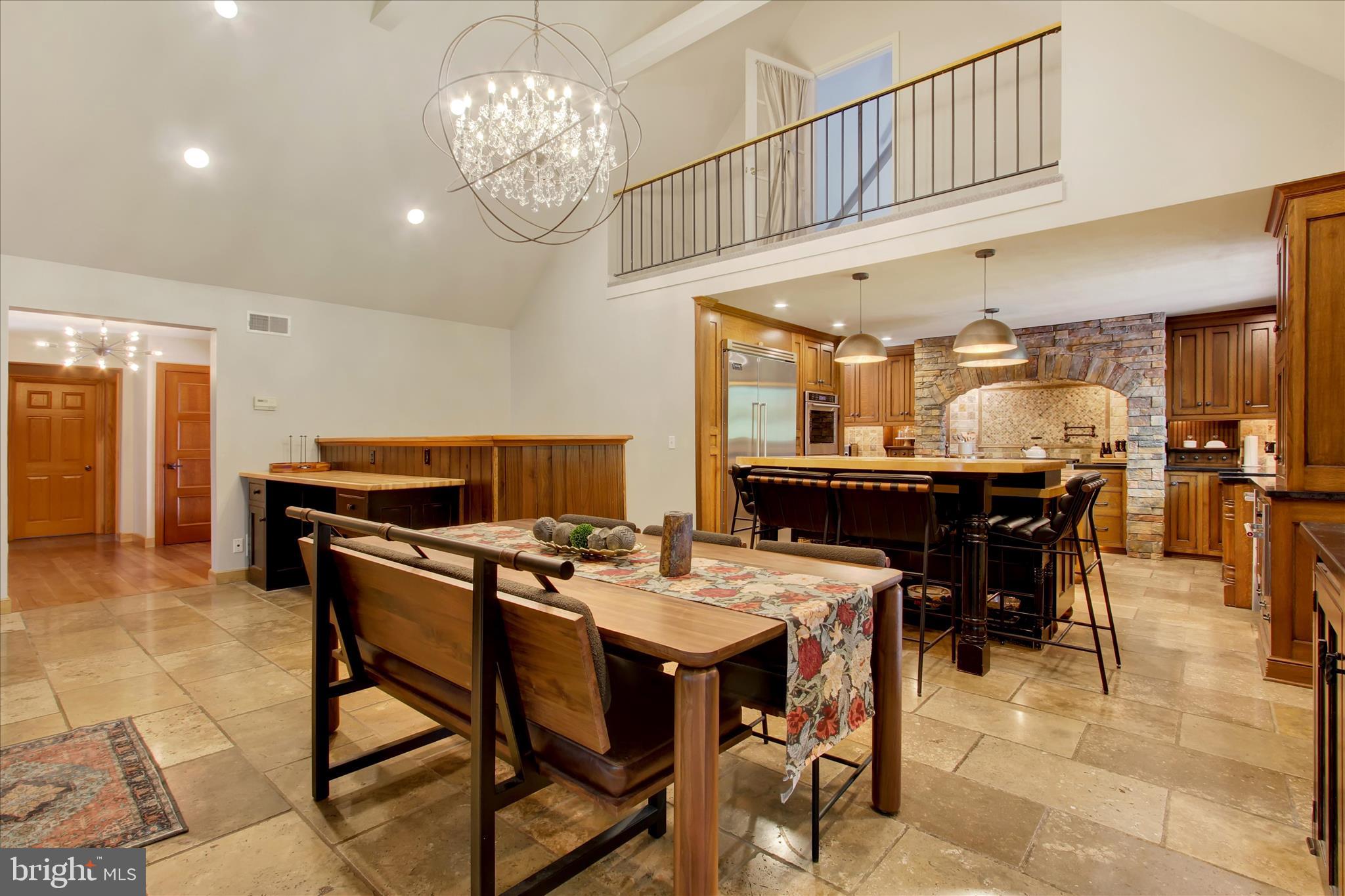 1855 Westwood Road York, PA 17403 - Photo 11 of 60 a view of a dining room with furniture and a chandelier