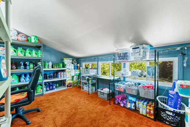 a room with lots of furniture and clutter