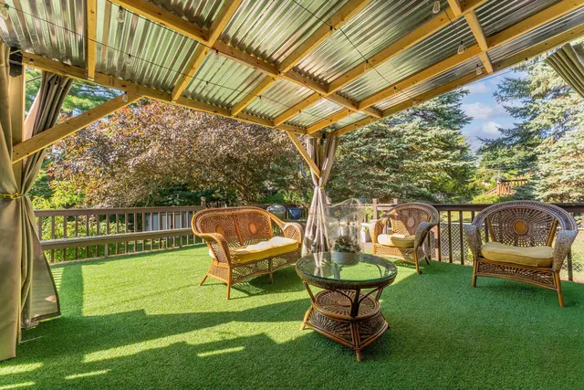 a garden view with a seating space