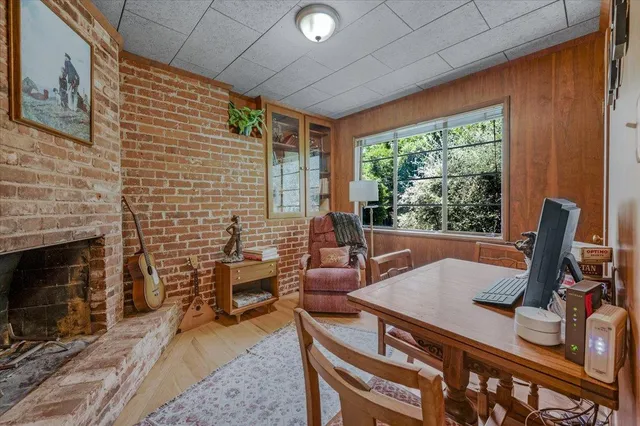 a view of a backyard with sitting area