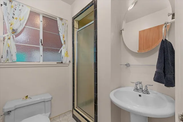 a view of a garden with houses