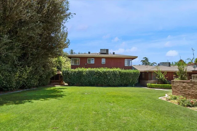 a bathroom with a sink toilet and a mirror