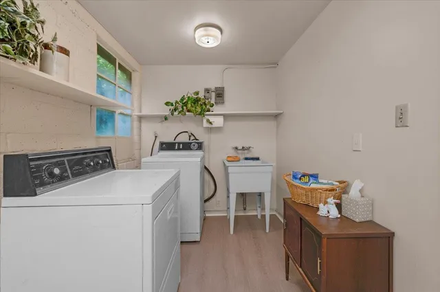 an aerial view of a house with outdoor space and street view