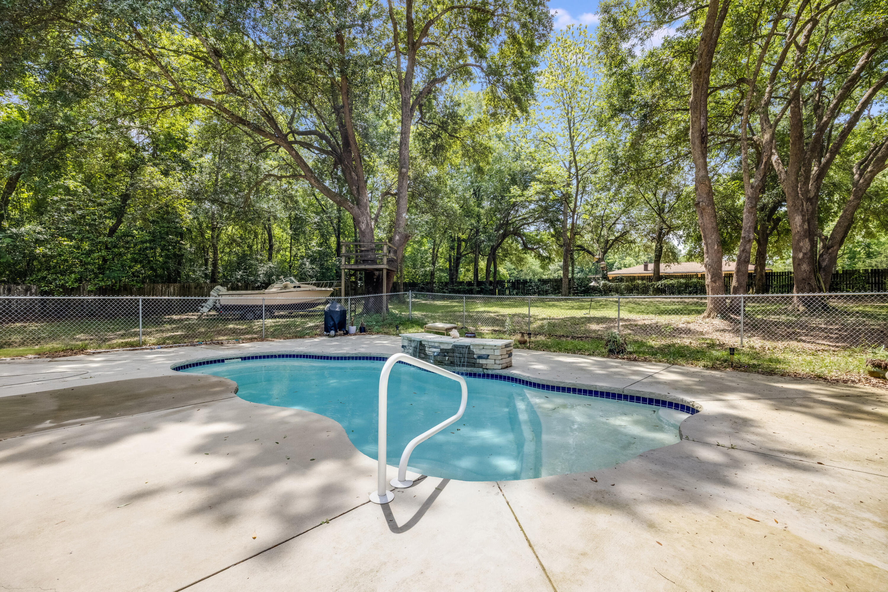 6633 Frank Reeder Road Pensacola, FL 32526 - Photo 12 of 43 a view of a swimming pool with a yard