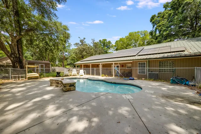 a backyard of a house with lots of green space