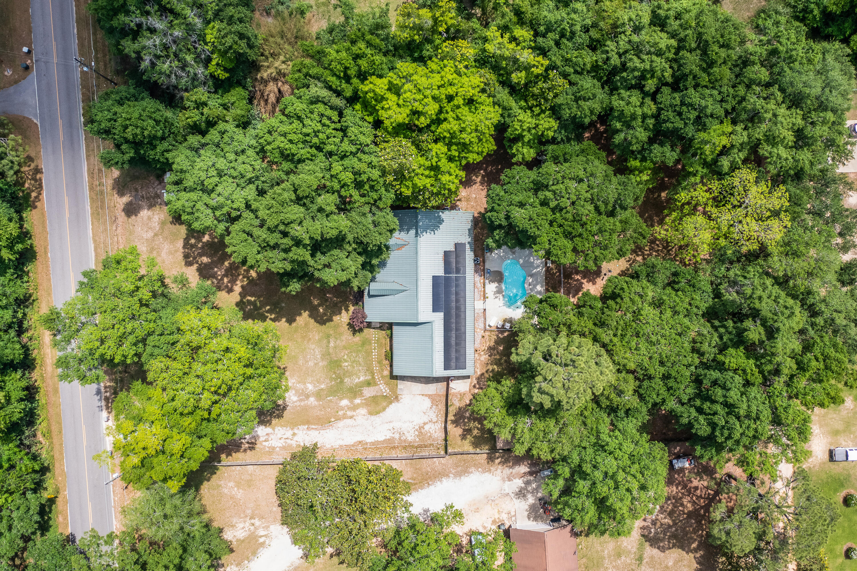 6633 Frank Reeder Road Pensacola, FL 32526 - Photo 18 of 43 a pathway of a house with yard