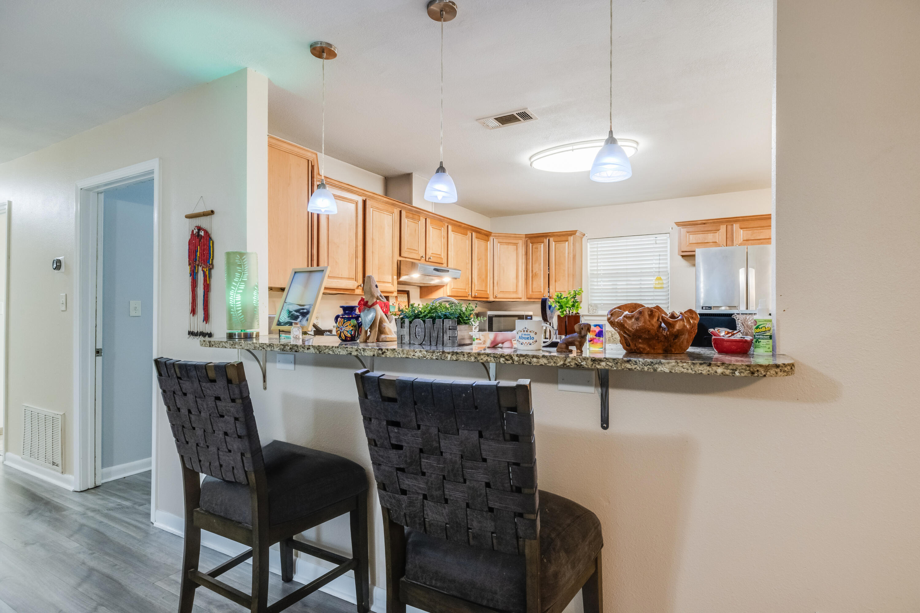 6633 Frank Reeder Road Pensacola, FL 32526 - Photo 34 of 43 a kitchen with a table and chairs in it