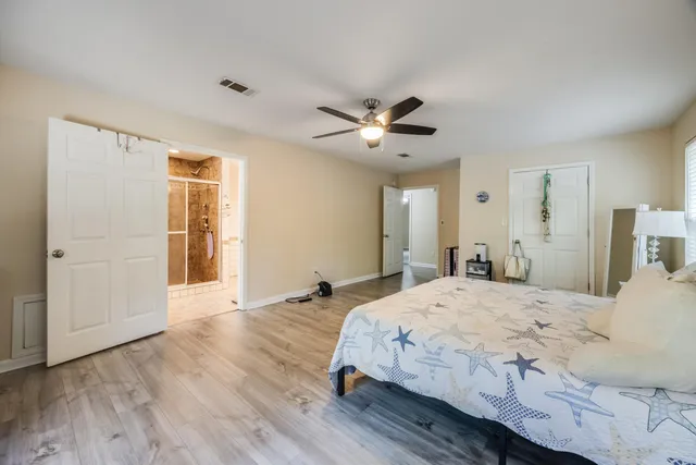 a bathroom with a tub and a shower