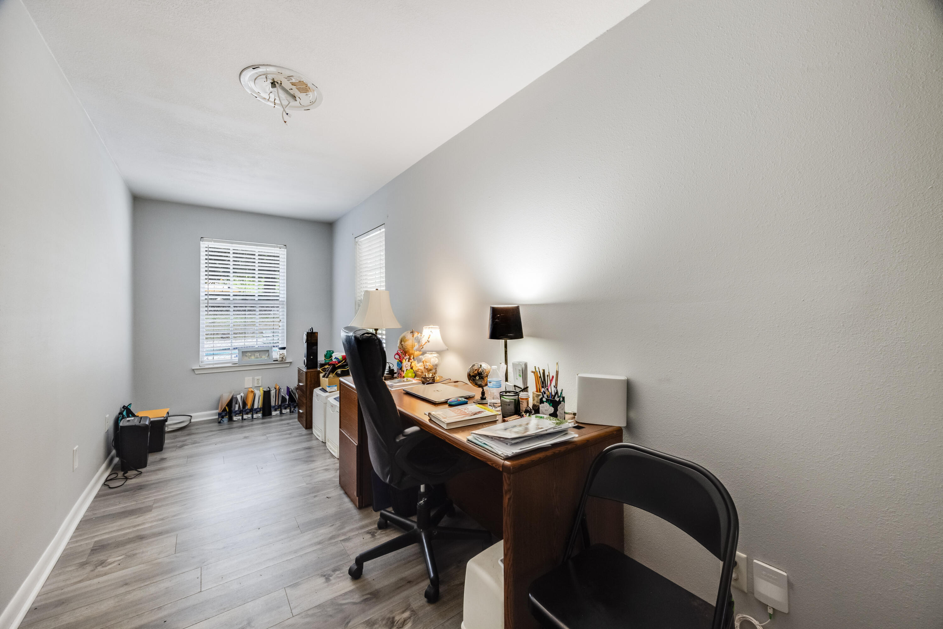 6633 Frank Reeder Road Pensacola, FL 32526 - Photo 40 of 43 a view of a dining room with furniture and chandelier