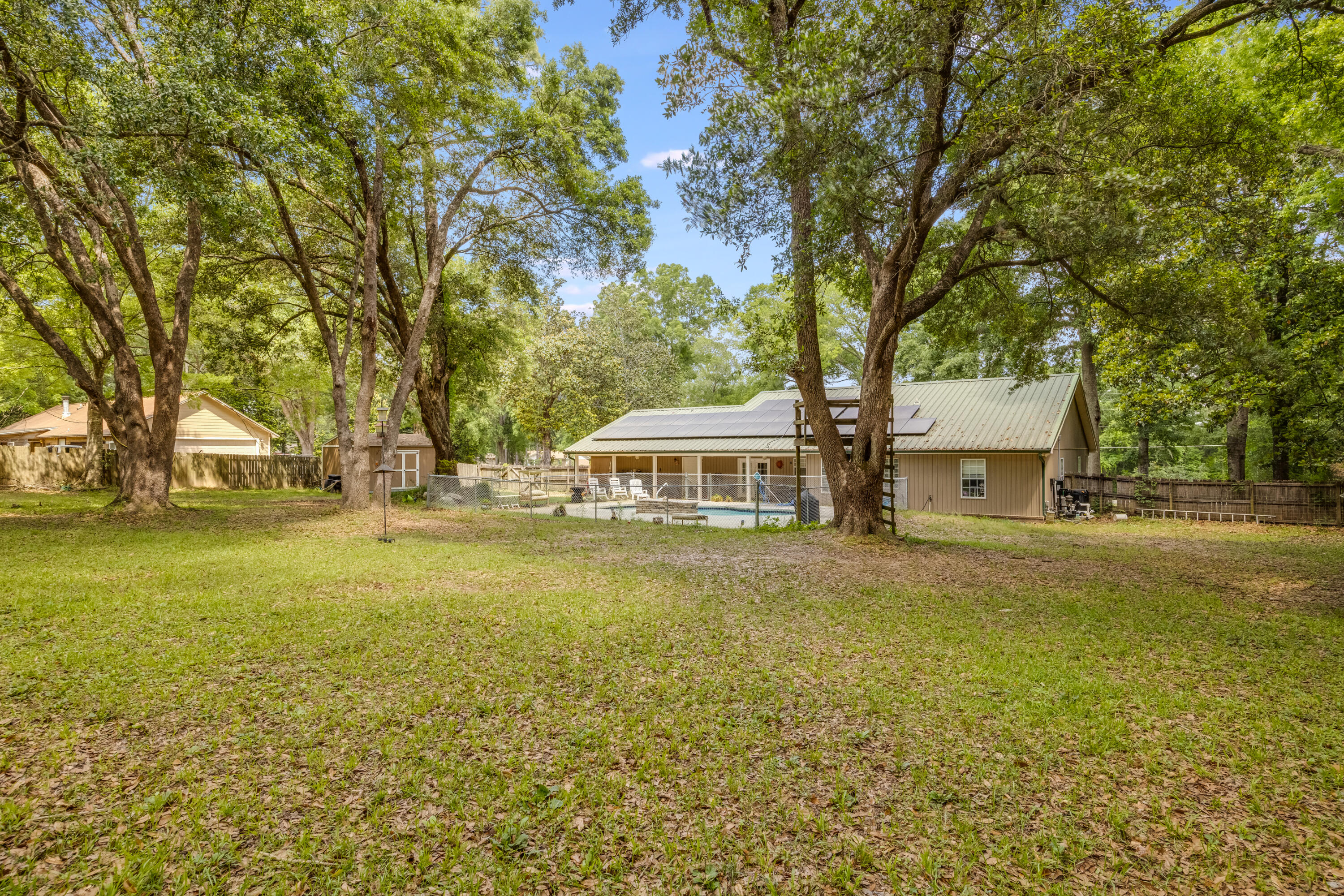 6633 Frank Reeder Road Pensacola, FL 32526 - Photo 10 of 43 a front view of house with yard and green space