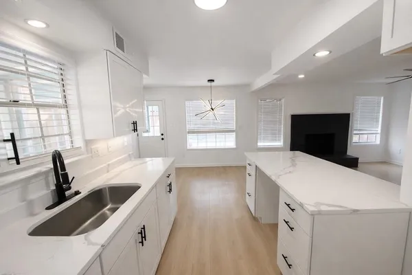 a view of a swimming pool with a backyard