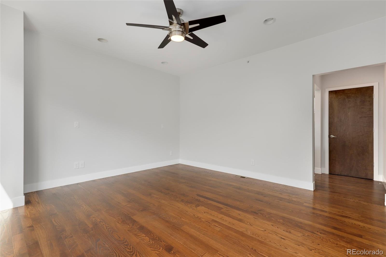 3336 Tejon Street, Unit 4 Denver, CO 80211 - Photo 23 of 35 wooden floor in an empty room