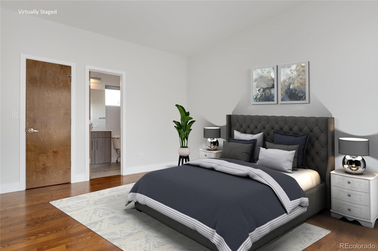 3336 Tejon Street, Unit 4 Denver, CO 80211 - Photo 3 of 35 a bedroom with a bed and wooden floor