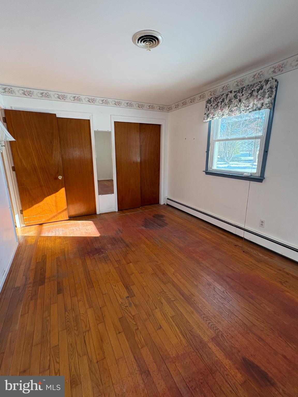 4671 Cliffs City Road Chestertown, MD 21620 - Photo 24 of 47 Bright and airy room with warm wood floors.