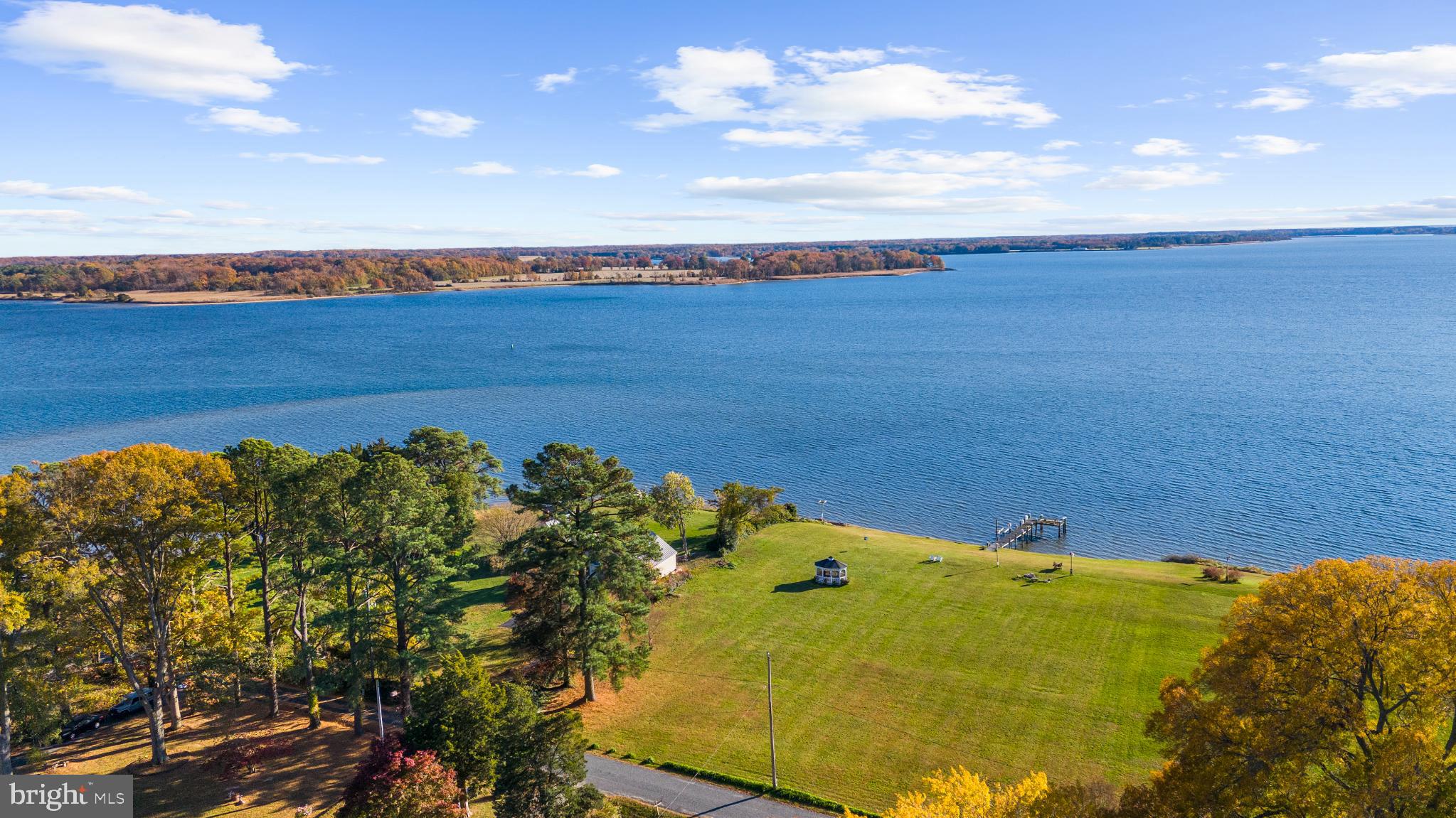 4671 Cliffs City Road Chestertown, MD 21620 - Photo 10 of 47 Serene waterfront view with vibrant foliage.