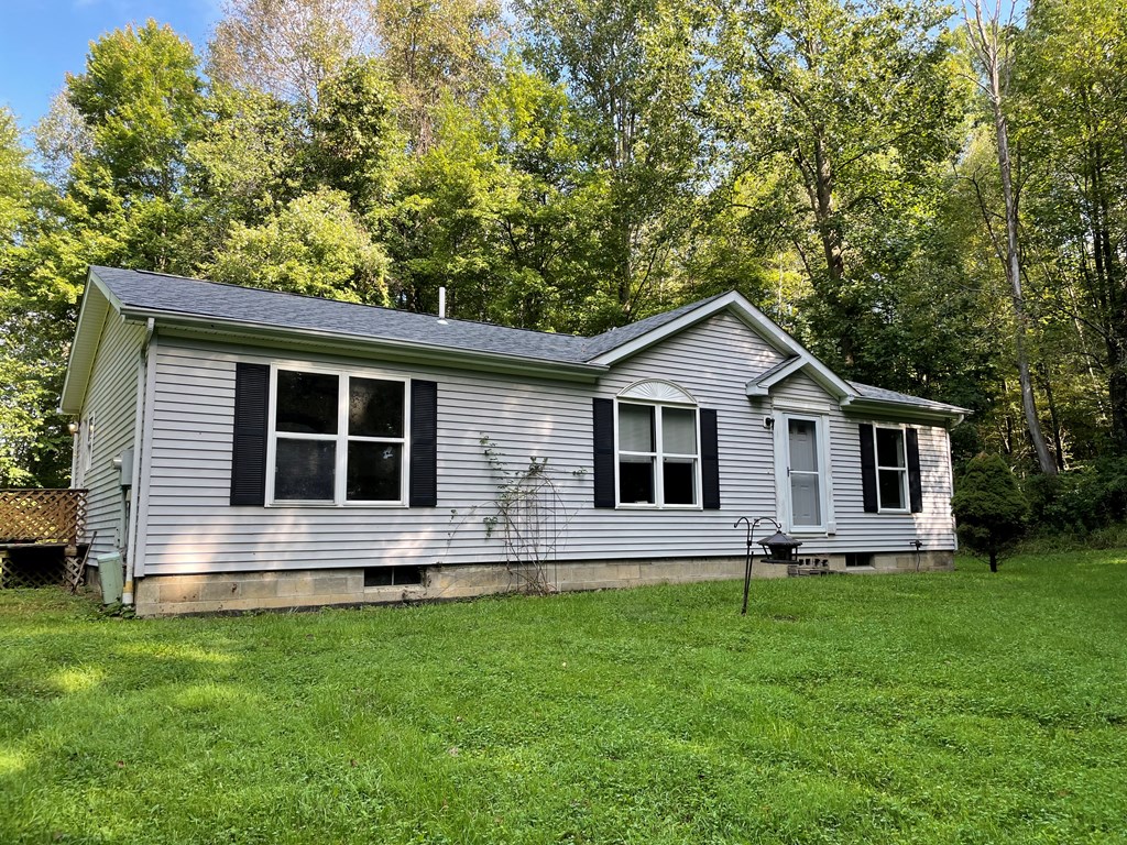 326 Stevens Road Utica, PA 16362 - Photo 4 of 11 a front view of house with yard and green space