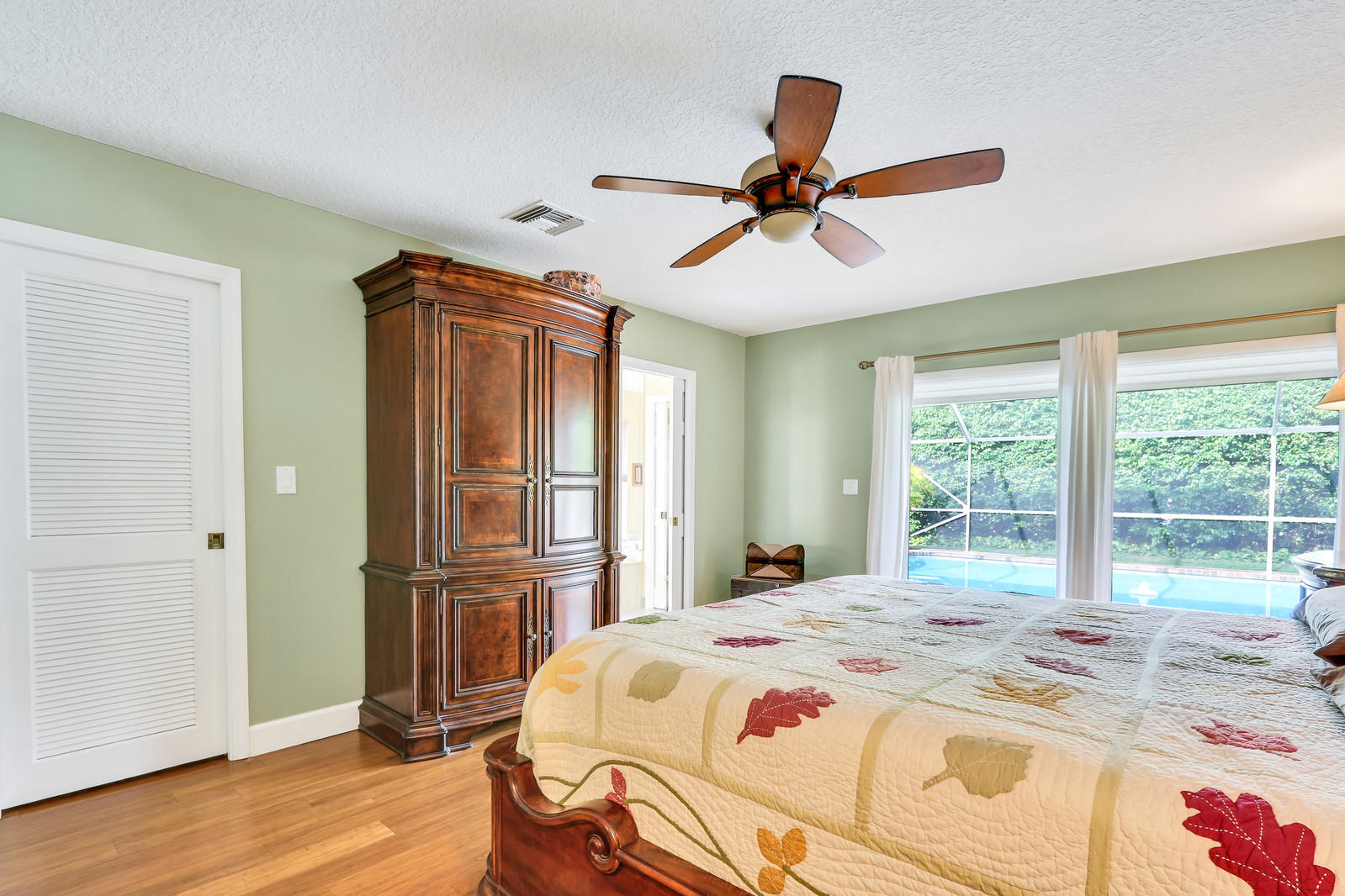2415 Northwest 40th Circle Boca Raton, FL 33431 - Photo 12 of 33 Master Bedroom - Overlooking The Pool