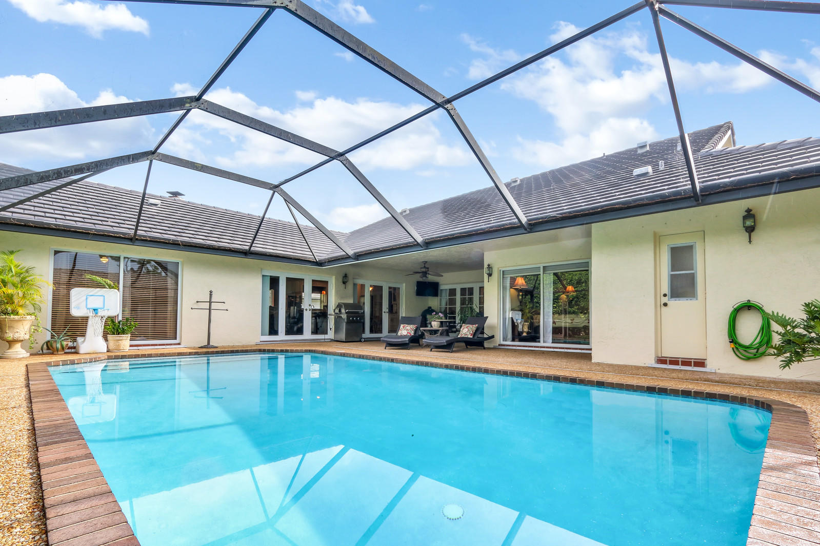 2415 Northwest 40th Circle Boca Raton, FL 33431 - Photo 22 of 33 Pool and Covered Patio