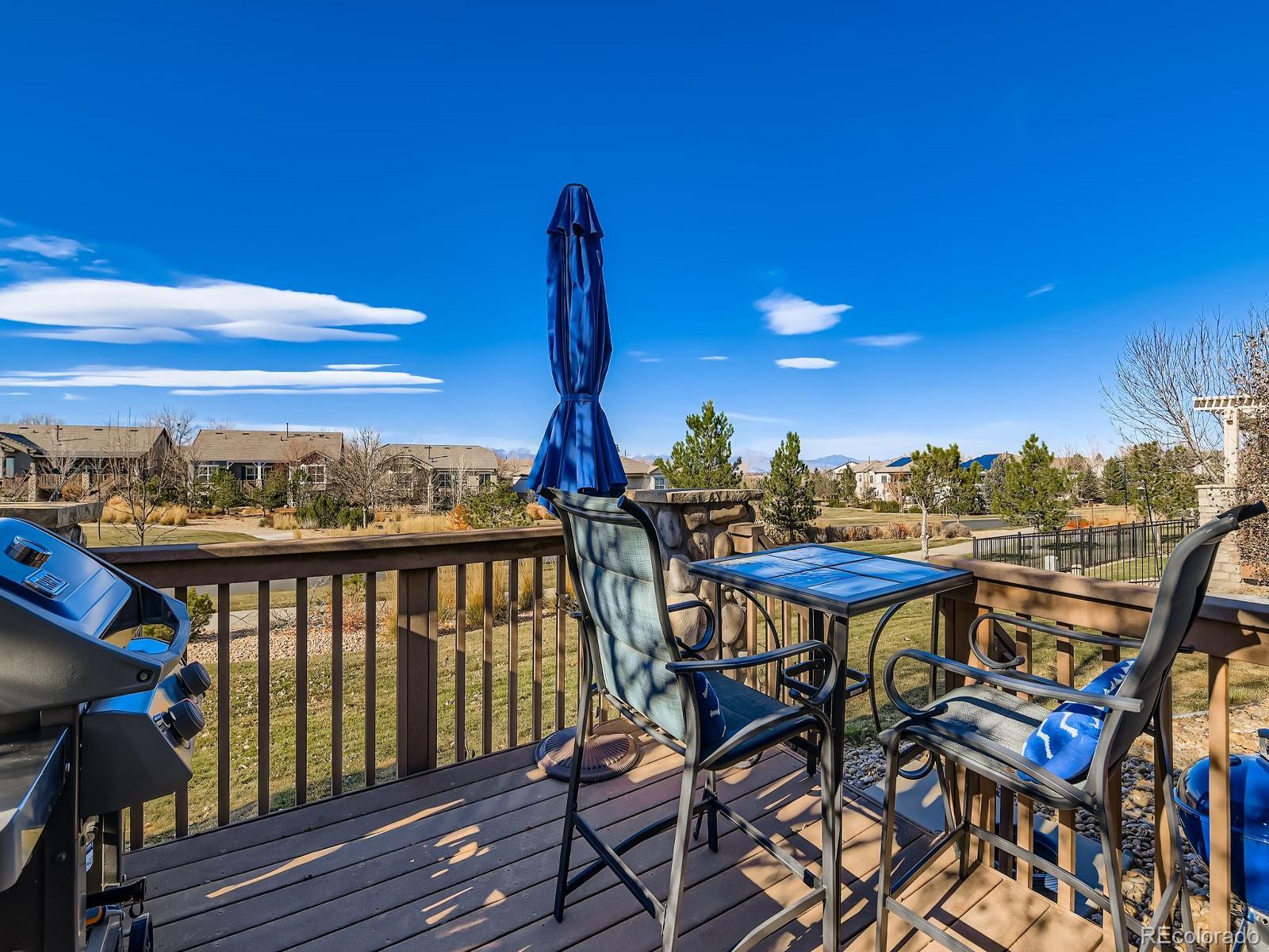 16545 Antero Circle Broomfield, CO 80023 - Photo 21 of 29 a view of a balcony with furniture and wooden floor