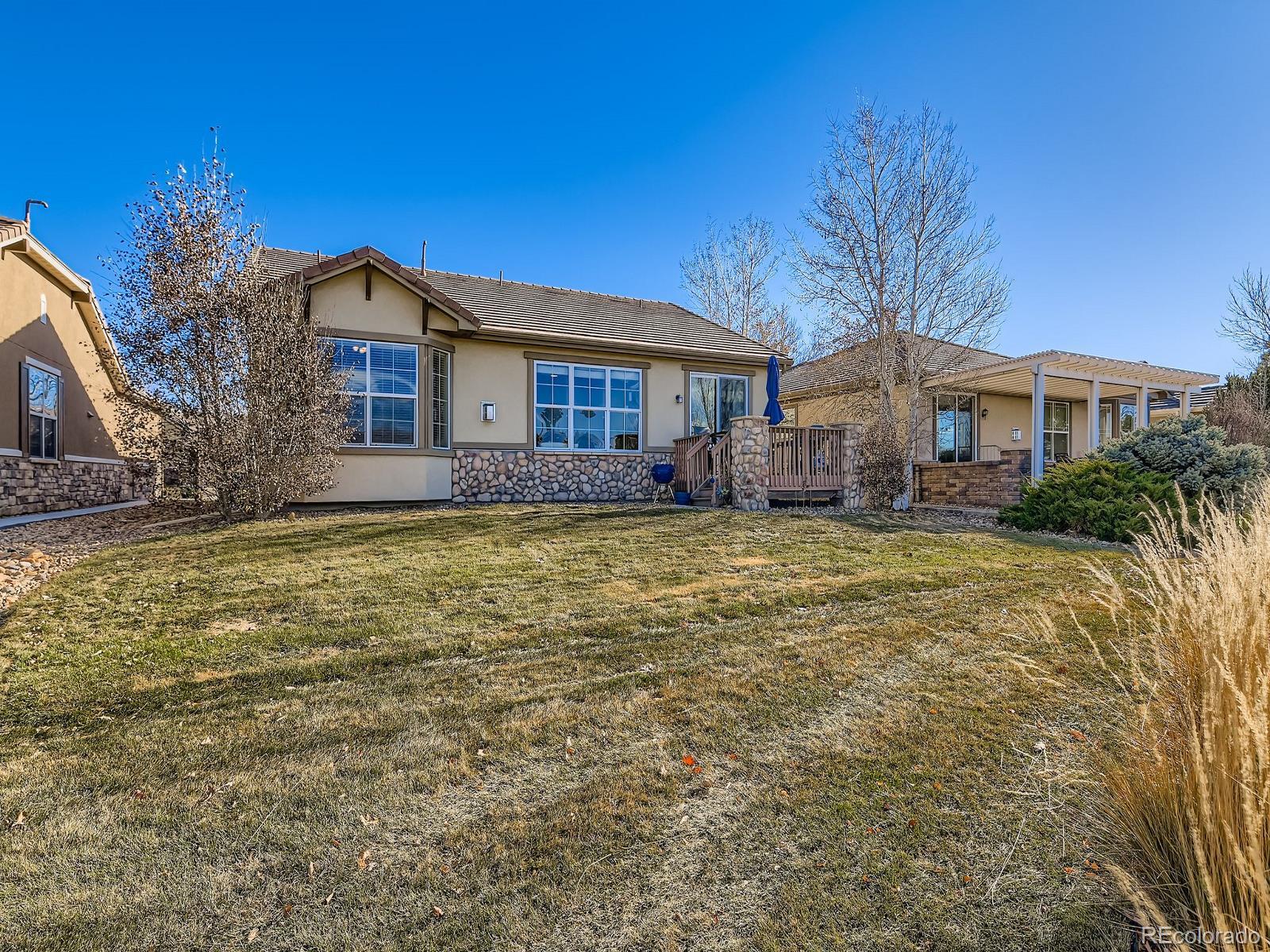 16545 Antero Circle Broomfield, CO 80023 - Photo 22 of 29 a front view of a house with a yard