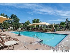 16545 Antero Circle Broomfield, CO 80023 - Photo 28 of 29 a view of a swimming pool with a lounge chairs
