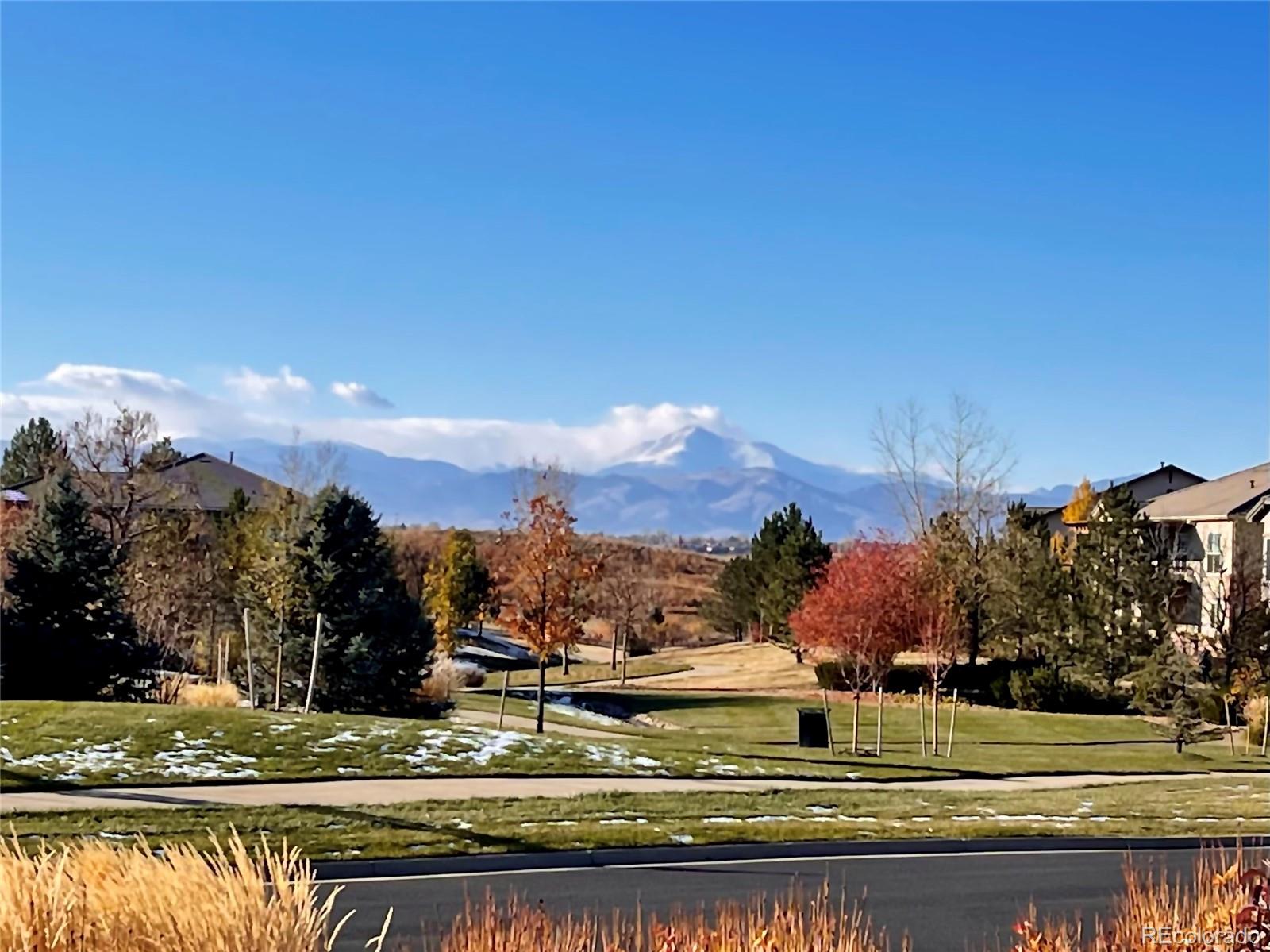 16545 Antero Circle Broomfield, CO 80023 - Photo 3 of 29 a view of a town with mountains in the background