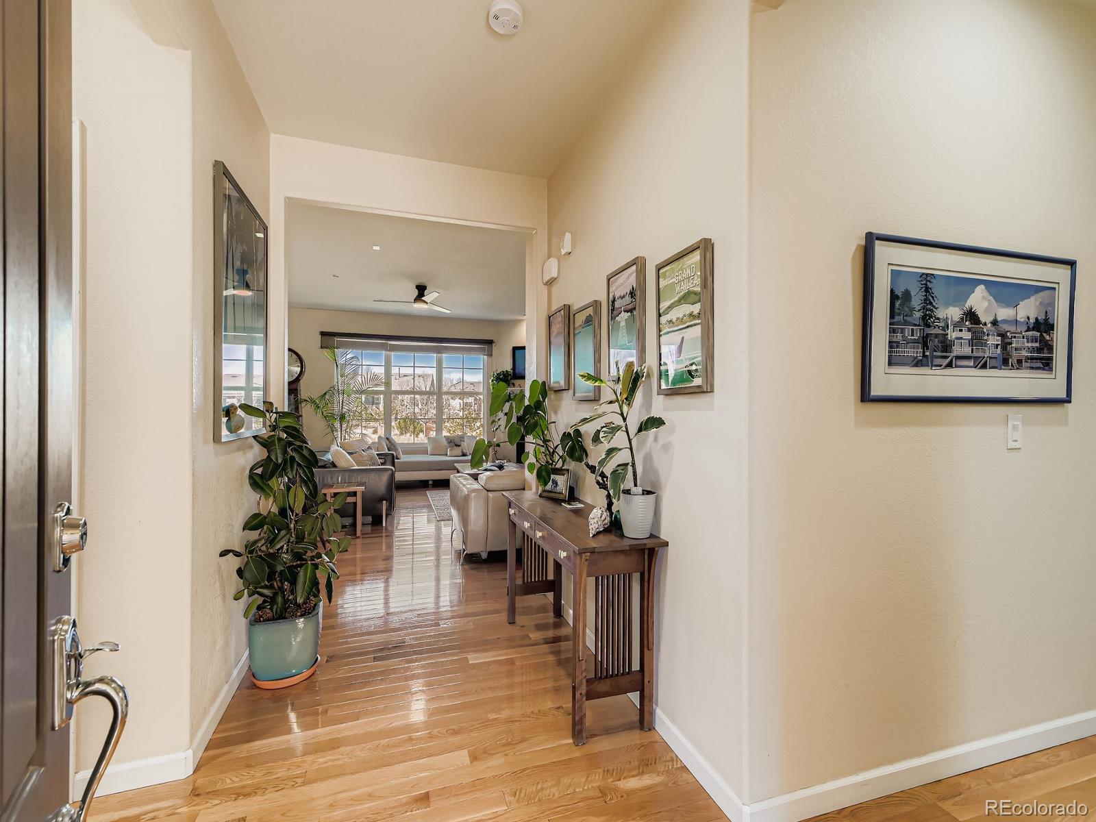 16545 Antero Circle Broomfield, CO 80023 - Photo 4 of 29 a living room with furniture and wooden floor