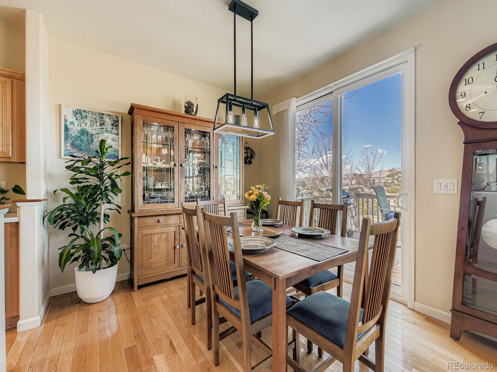 16545 Antero Circle Broomfield, CO 80023 - Photo 6 of 29 a dining room with furniture window and wooden floor