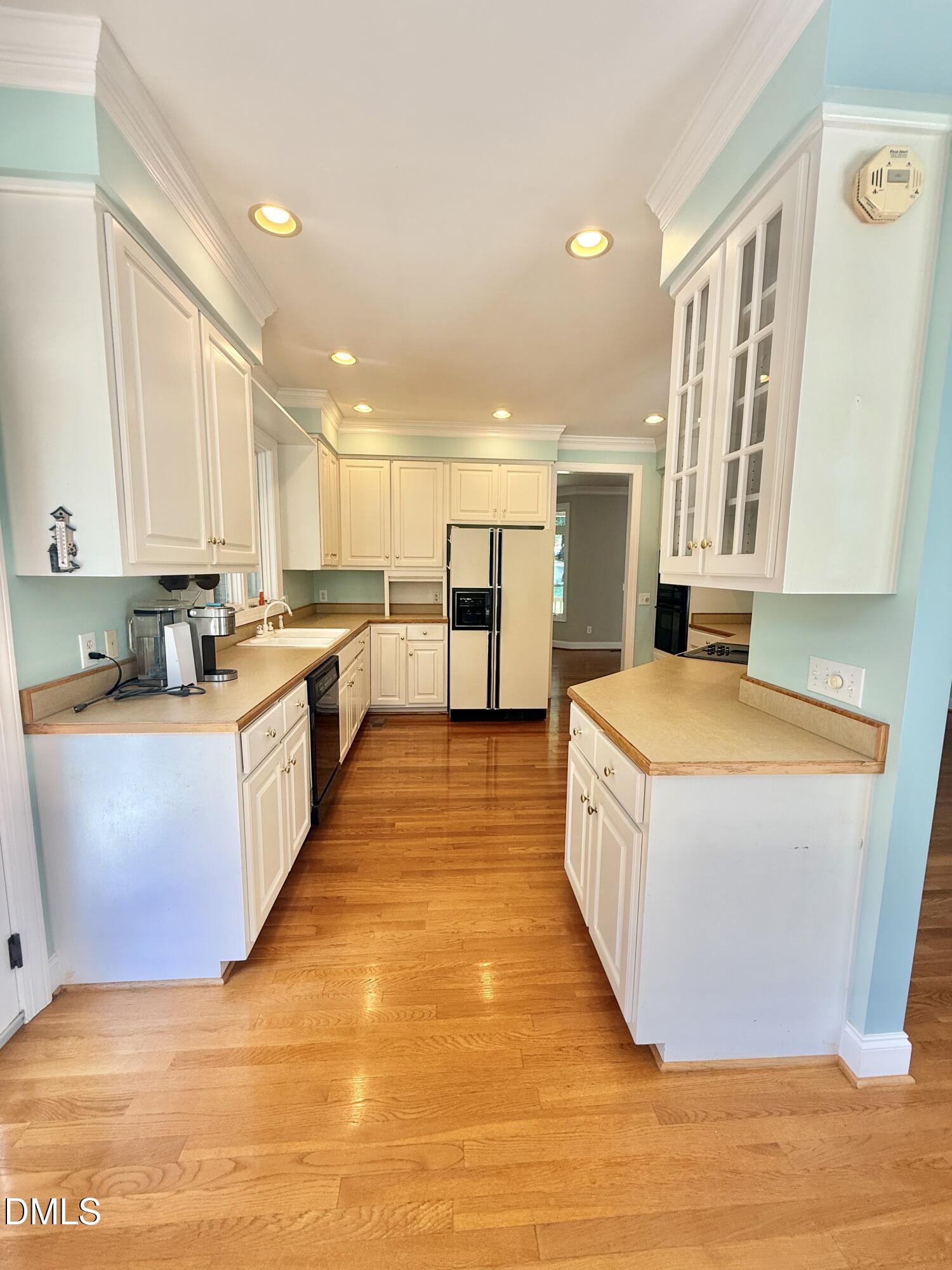 81 Beaver Crossing Road Roxboro, NC 27574 - Photo 17 of 80 a large kitchen with stainless steel appliances granite countertop a large counter top a stove a sink and a refrigerator