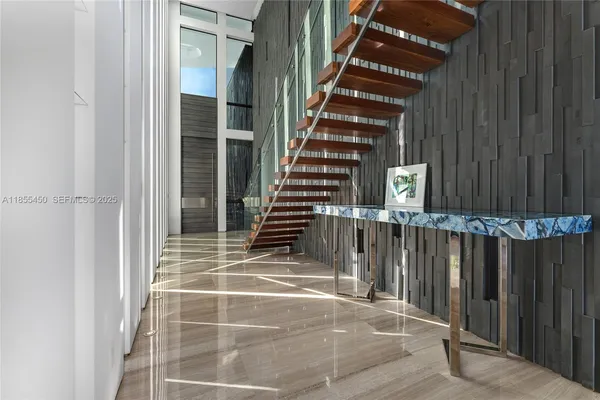 a kitchen with stainless steel appliances kitchen island granite countertop lots of counter top space