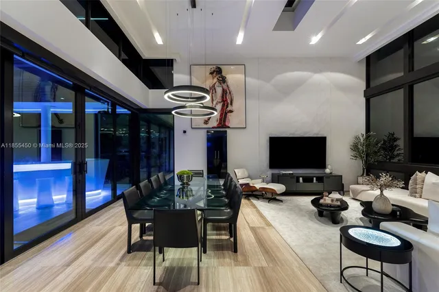 a bedroom with a bed and glass door