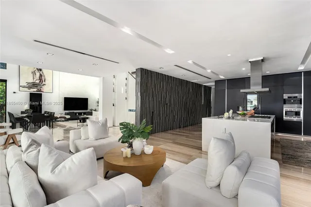 a potted plant sitting in front of a house with a yard