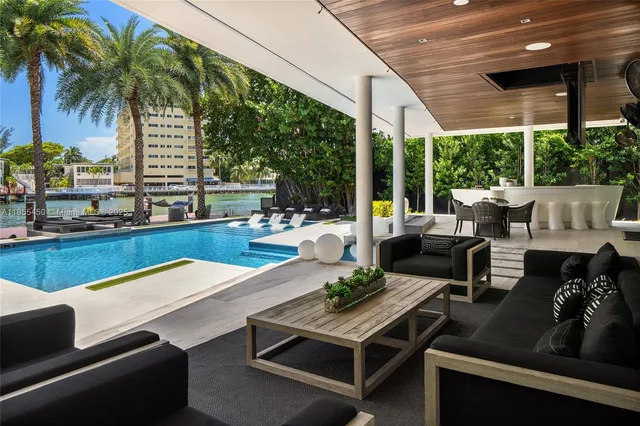 a view of a chairs and table on the terrace