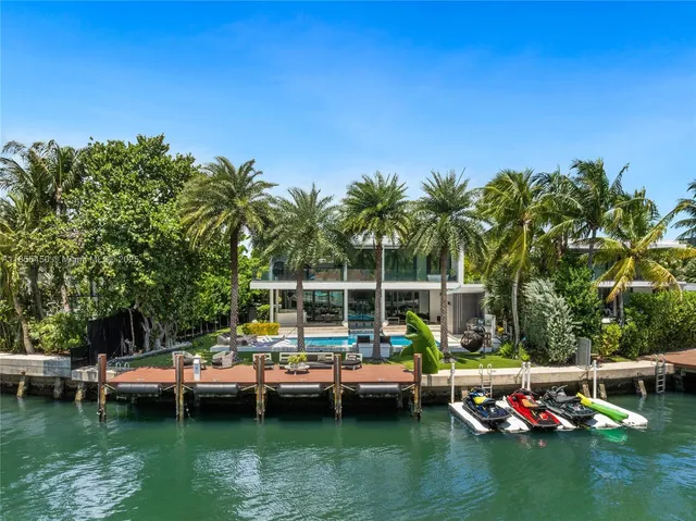 a view of a chairs and table in the garden