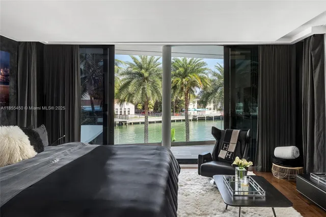 a bathroom with a sink mirror and a shower