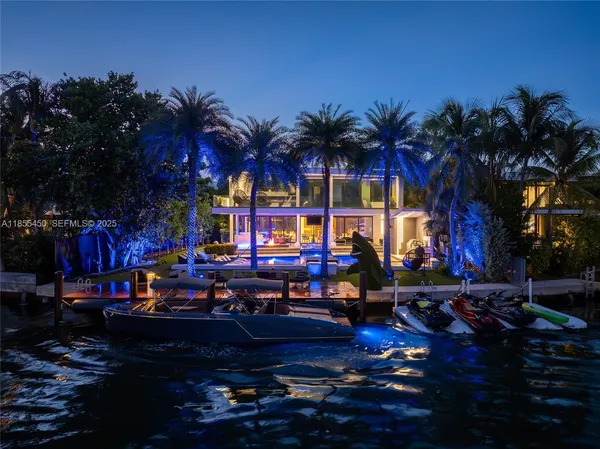a view of swimming pool with outdoor seating