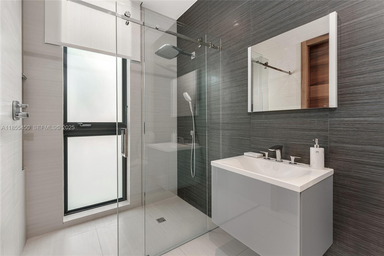 528 Lakeview Court Miami Beach, FL 33140 - Photo 67 of 84 a bathroom with a sink toilet and shower