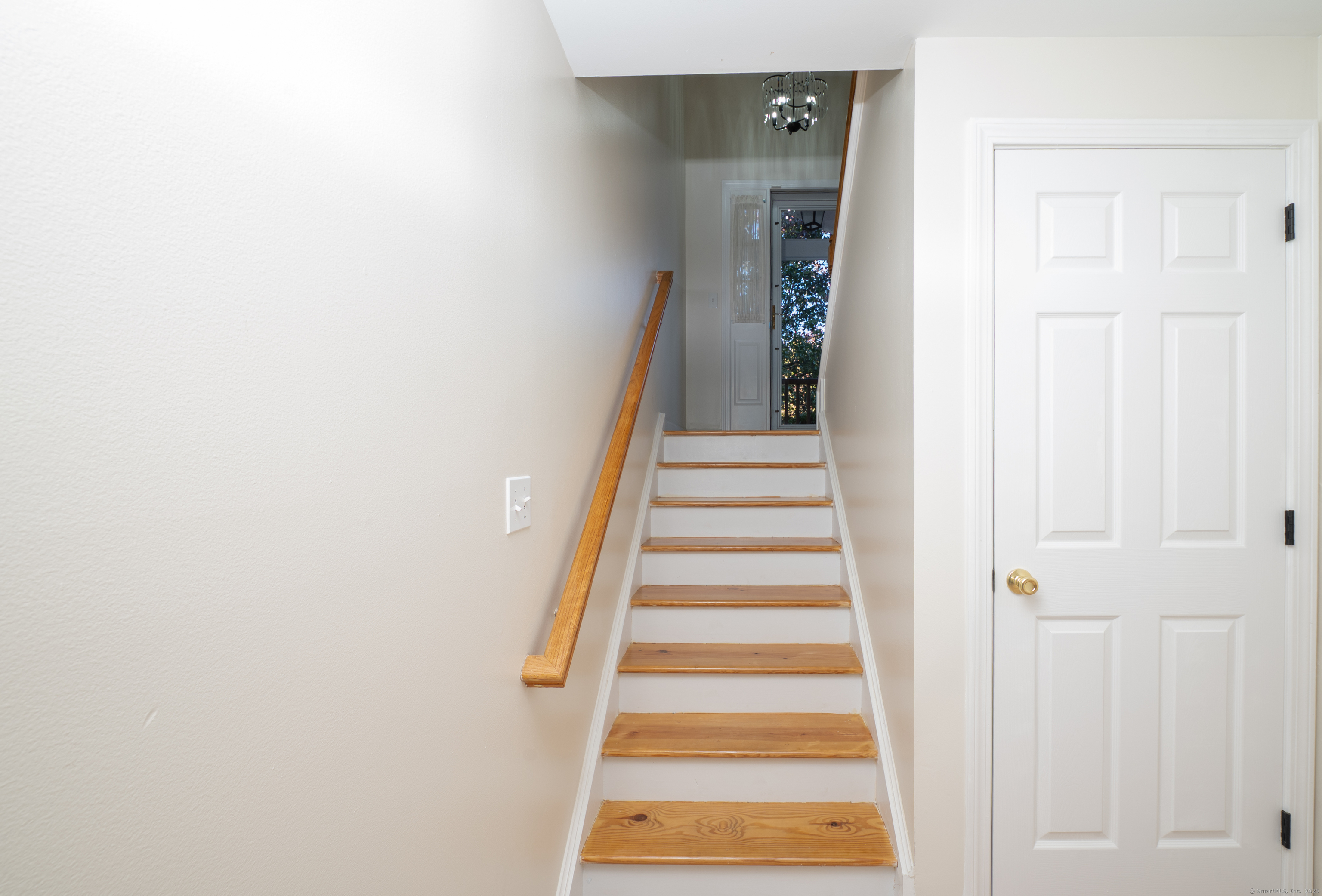1 Munson Drive, Unit 3 Wallingford, CT 06492 - Photo 16 of 38 a view of a hallway with wooden floor and entryway