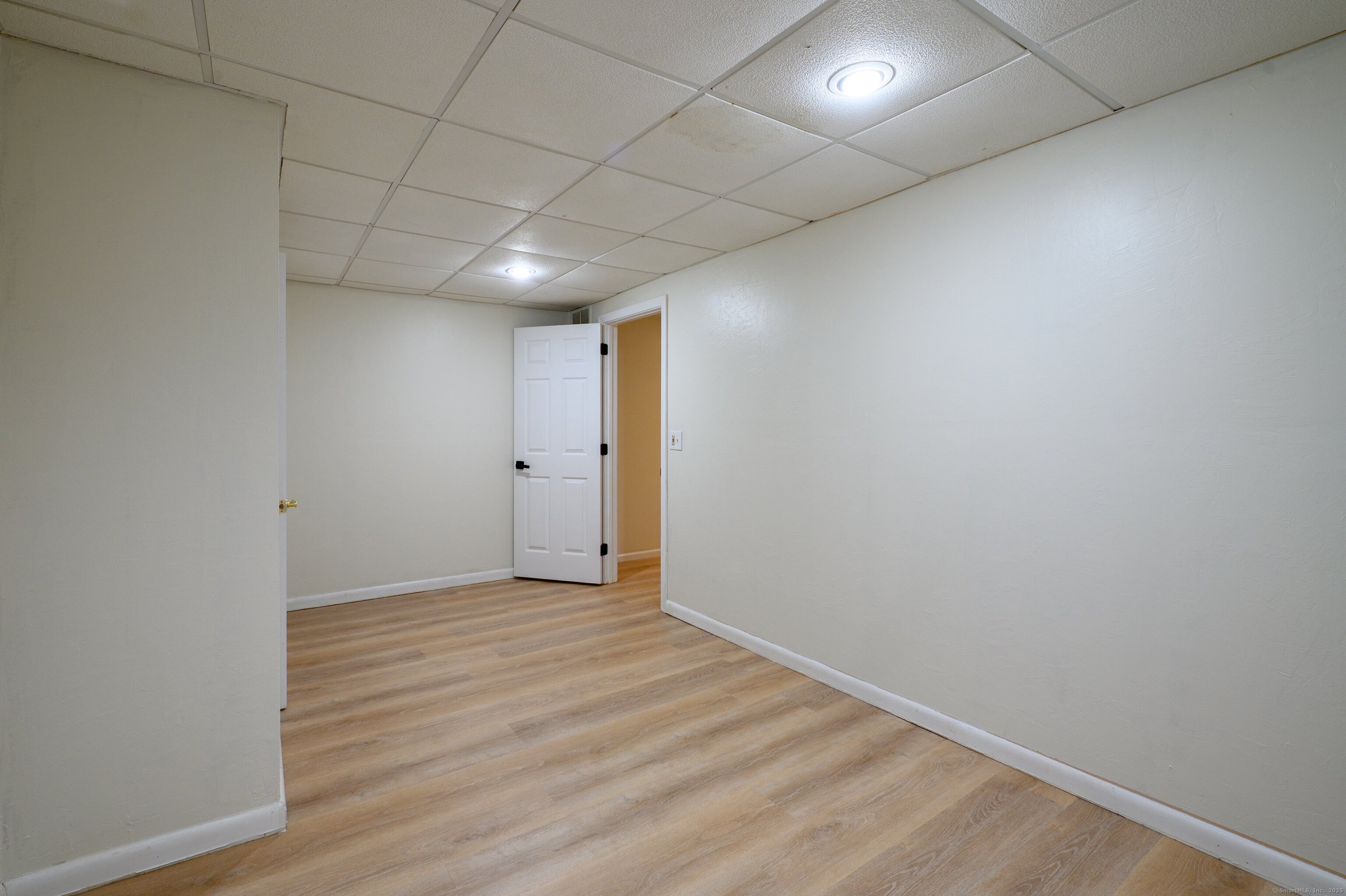 1 Munson Drive, Unit 3 Wallingford, CT 06492 - Photo 18 of 38 a view of hallway with an empty room