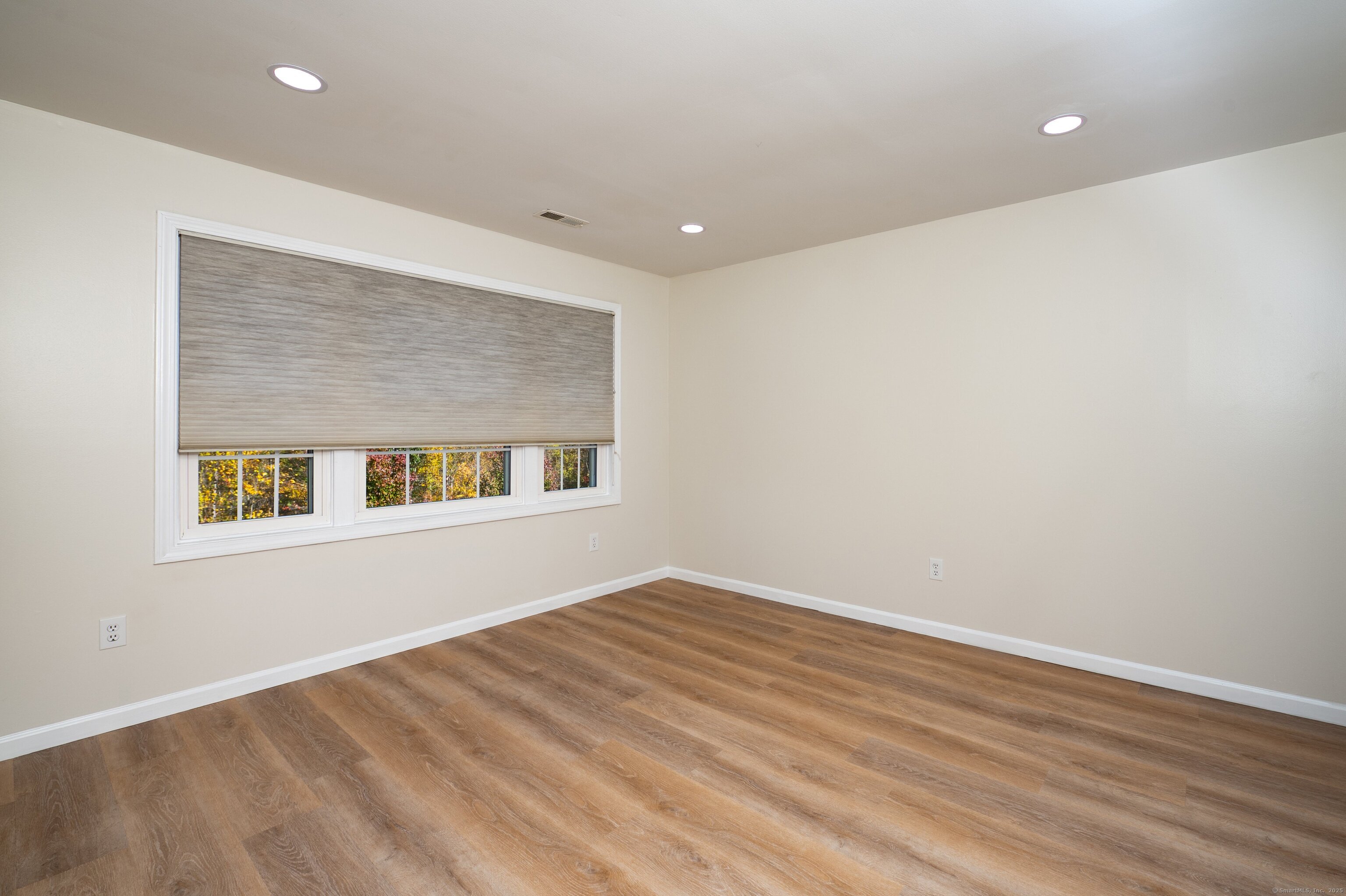 1 Munson Drive, Unit 3 Wallingford, CT 06492 - Photo 20 of 38 a view of an empty room with a window