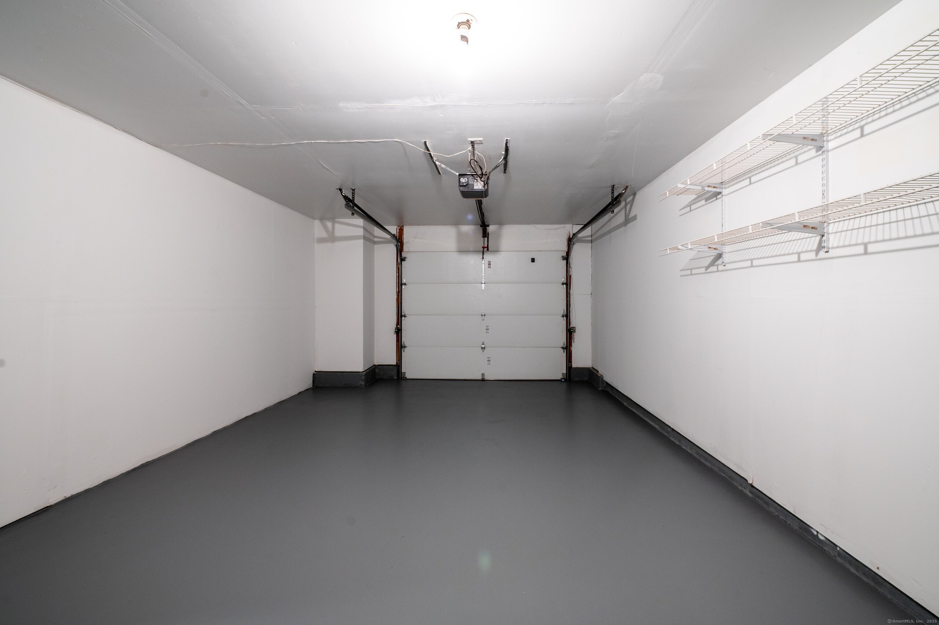 1 Munson Drive, Unit 3 Wallingford, CT 06492 - Photo 35 of 38 a view of a garage