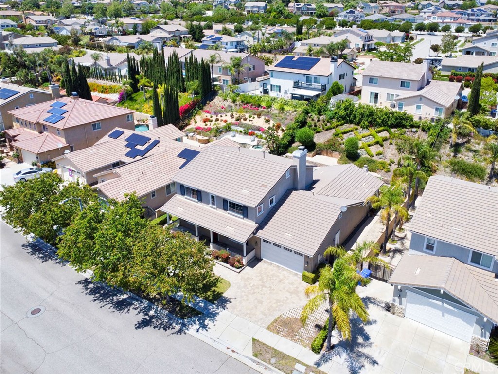 12430 Split Rein Drive Rancho Cucamonga, CA 91739 - Photo 29 of 29 an aerial view of a house with a garden
