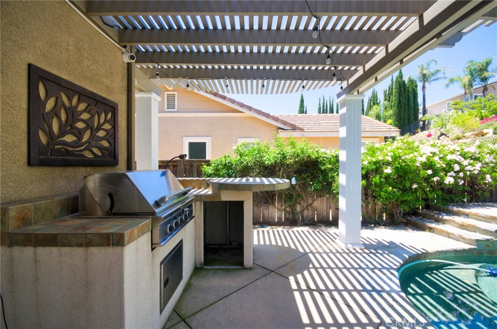 12430 Split Rein Drive Rancho Cucamonga, CA 91739 - Photo 5 of 29 a view of a porch with furniture