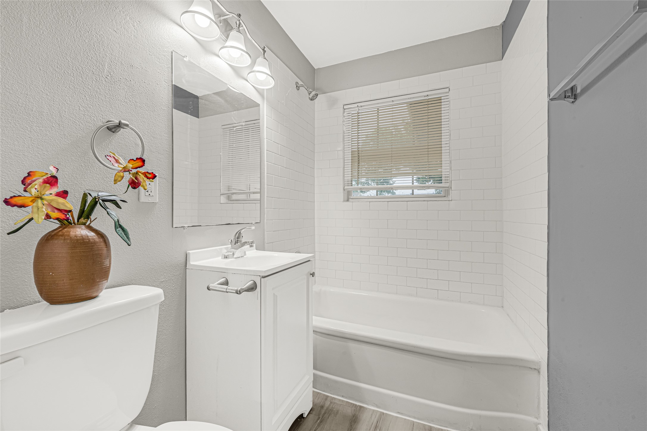 5009 Bataan Road Houston, TX 77033 - Photo 24 of 24 a bathroom with a sink toilet and shower