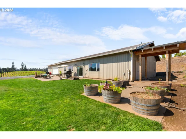 a kitchen with a dining table chairs stove and kitchen view